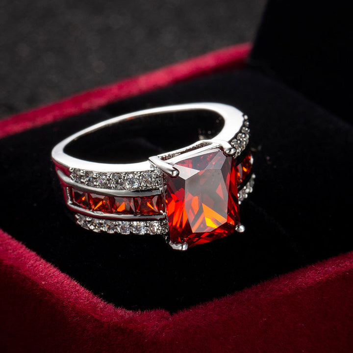 Anello color argento con Pietra Rossa a Spacco