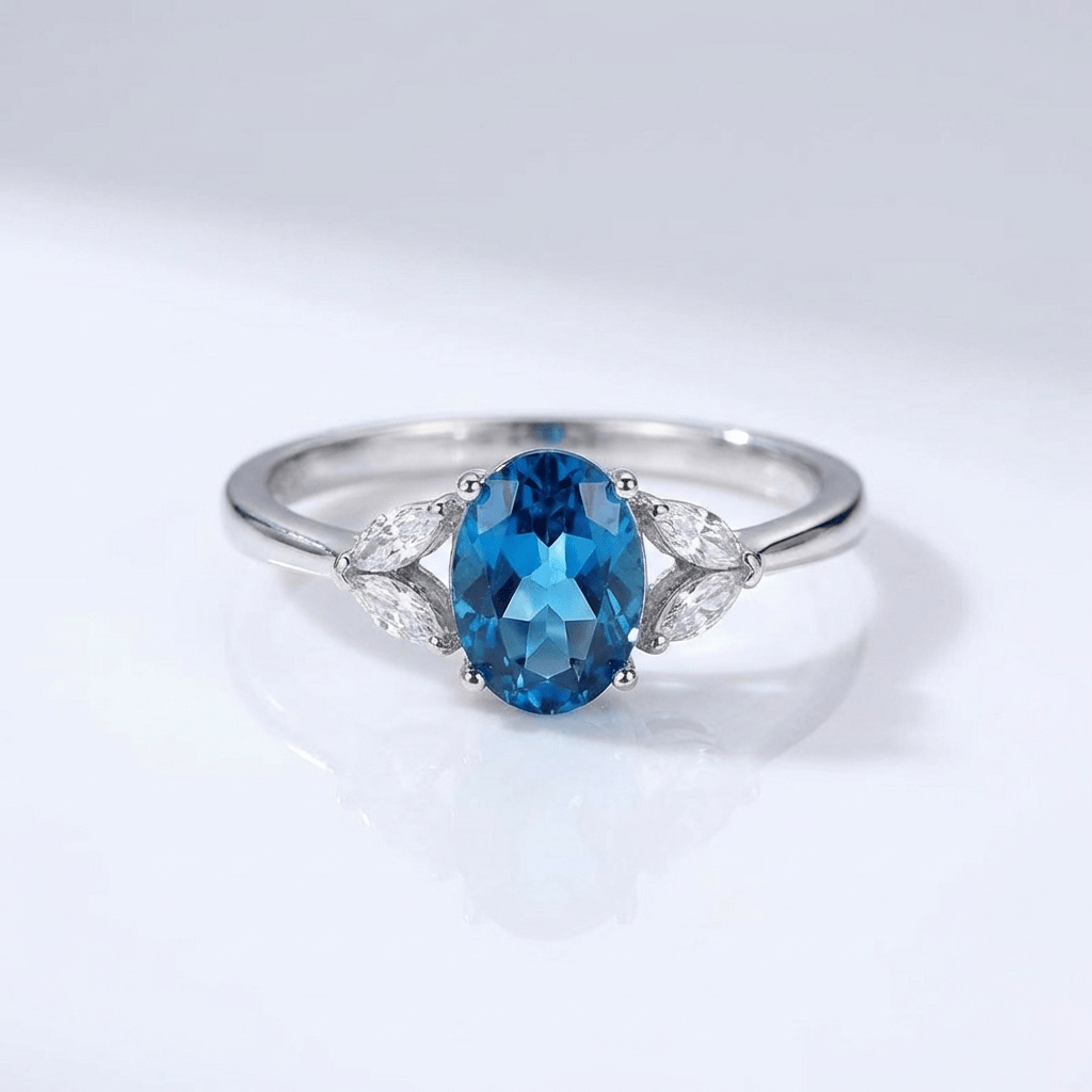 ANELLO OVALE IN TOPAZIO BLU ARGENTO - (REGOLABILE)