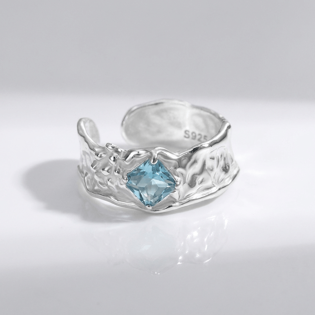 ANELLO TEXTURIZZATO IN ACQUAMARINA ARGENTATA - (REGOLABILE)