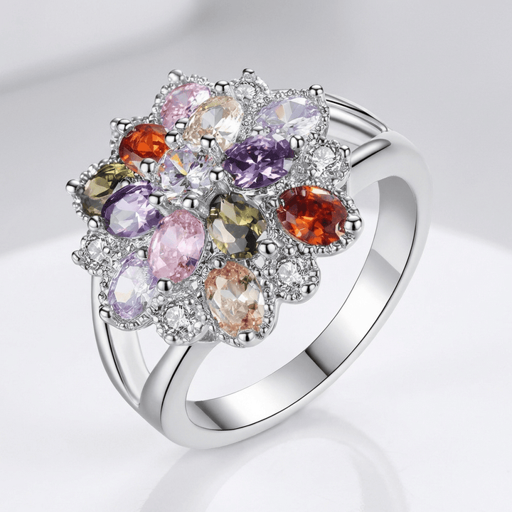 ANELLO A SCOSSA CON GEMME RAINBOW ARGENTATE