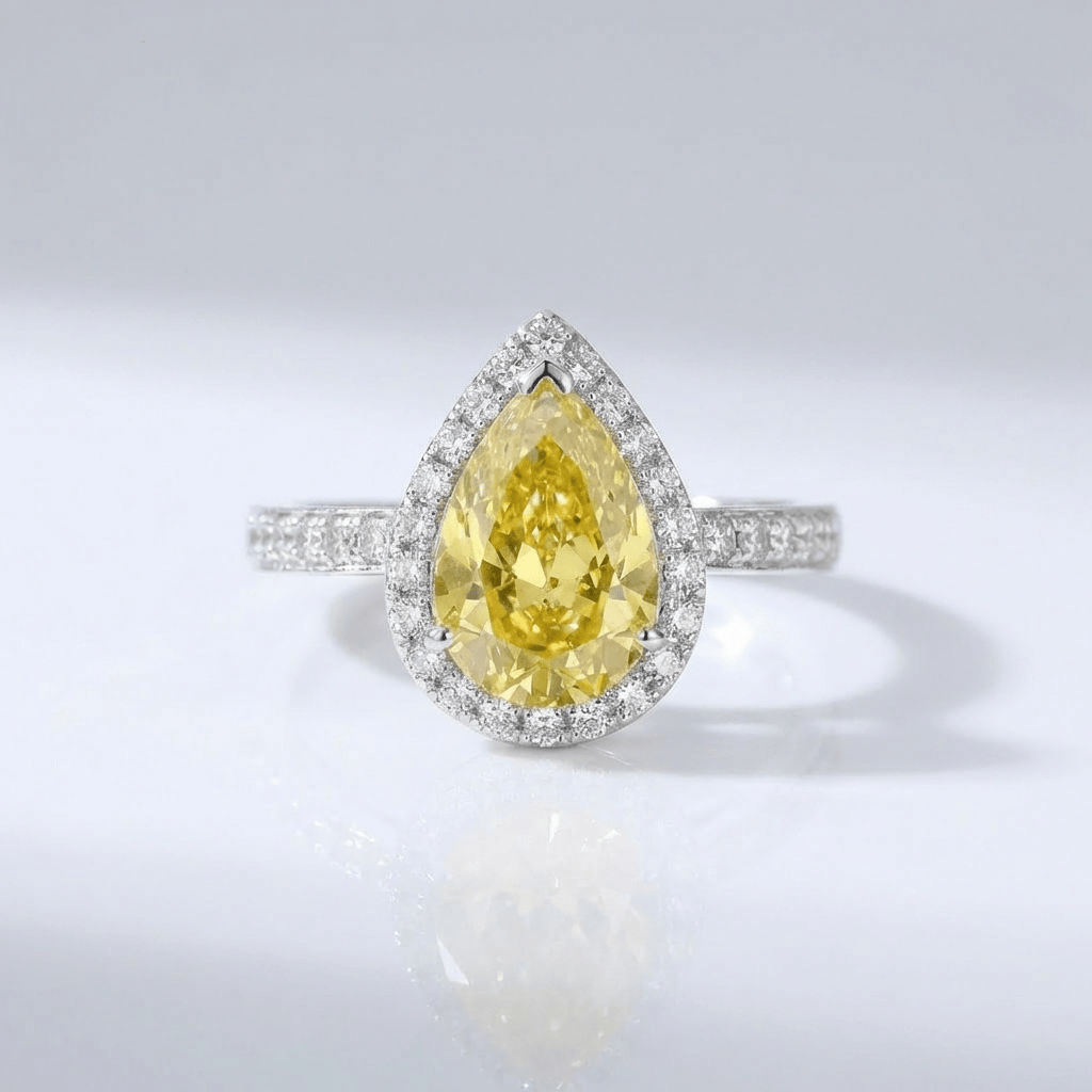 ANELLO HALO CON Zirconia PERA GIALLO