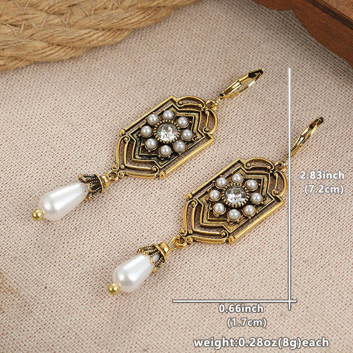Orecchini Vintage in Perla Incastonata d'Oro