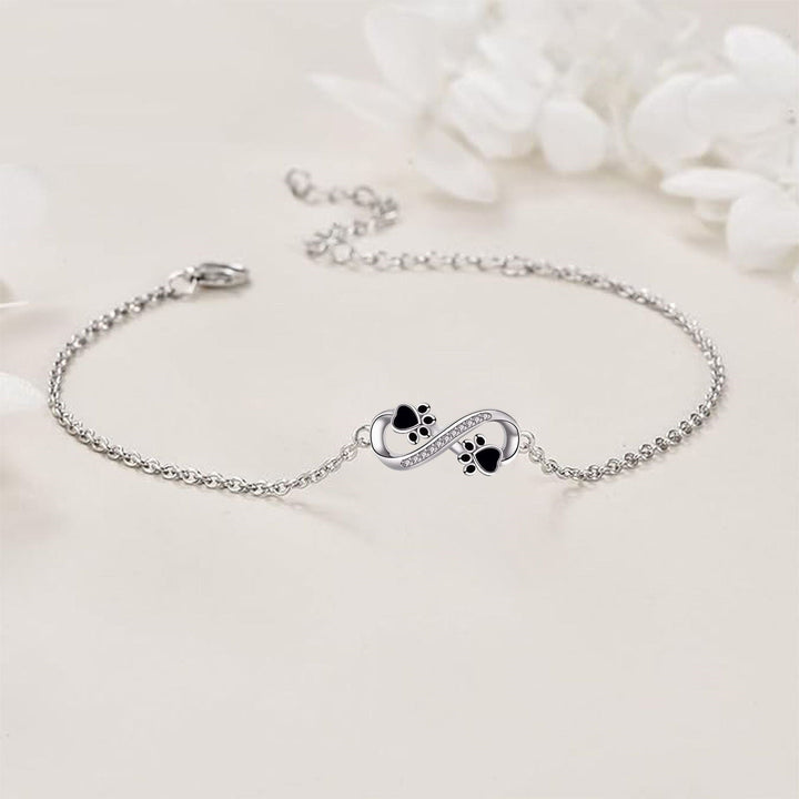 Bracciale con Pendente Simbolo Infinito e Zampe di Animale con Zirconia