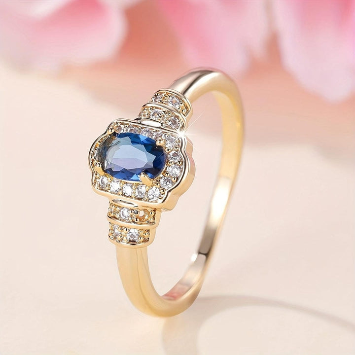 Anello in Cristallo con Halo di Pietra Blu Eredità