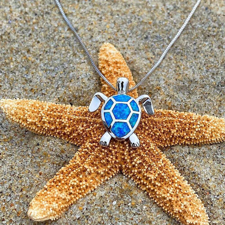 Collana e Orecchini a Forma di Tartaruga Marina in Opale e color argento