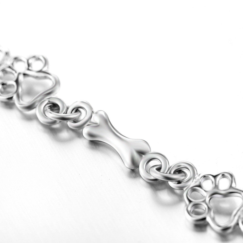Braccialetto color argento Puro Edizione Limitata con Charm a Forma di Zampa e Osso di Cane