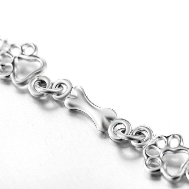 Braccialetto color argento Puro Edizione Limitata con Charm a Forma di Zampa e Osso di Cane
