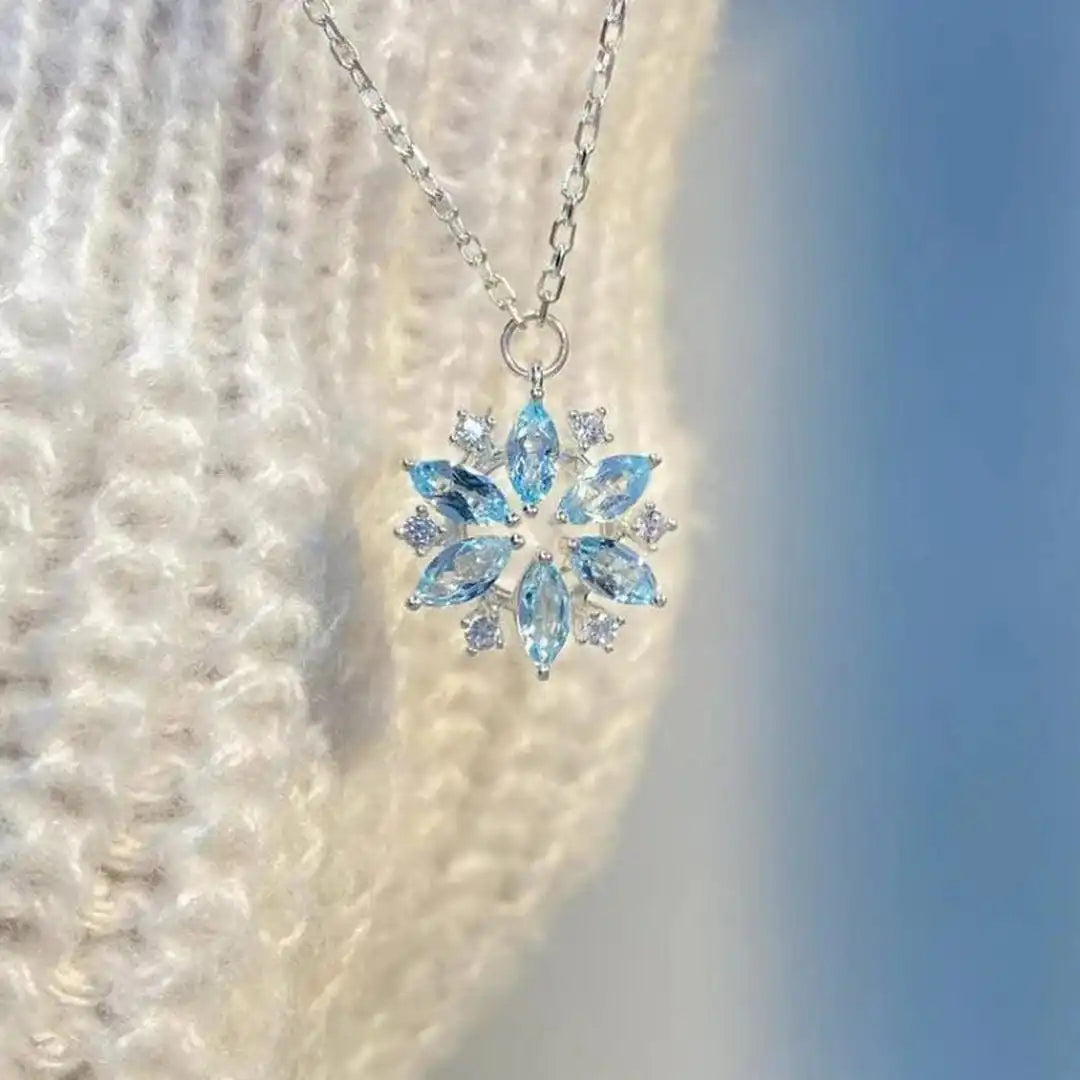 Ciondolo a Fiore di Neve Blu color oro Bianco
