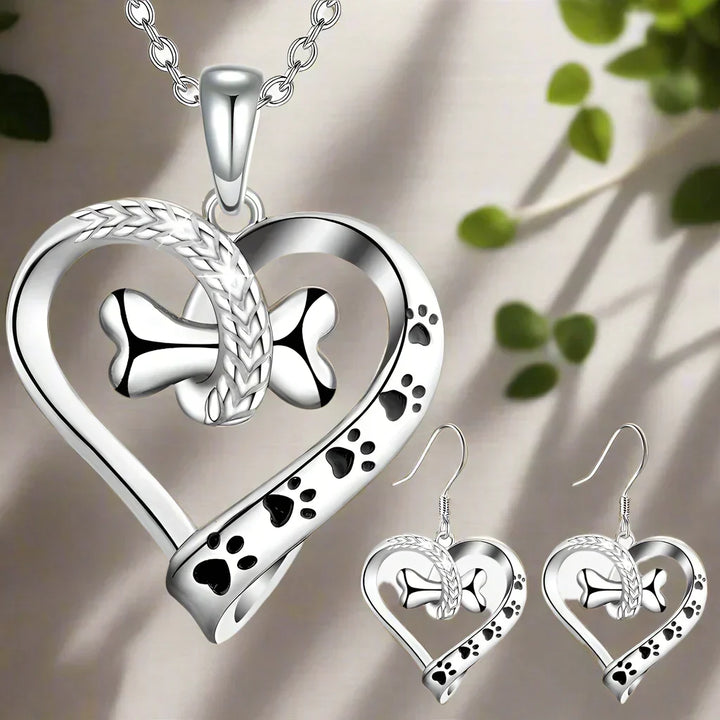 Set di gioielli in 2 pezzi con ciondoli a forma di zampa, cuore e osso