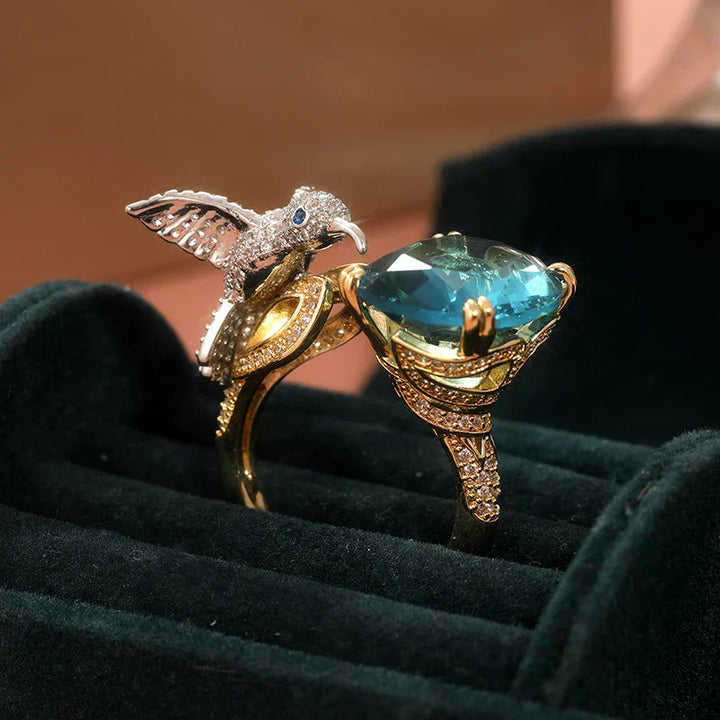 Anello Regolabile Colore Acquamarina con Colibrì – Placcato Oro