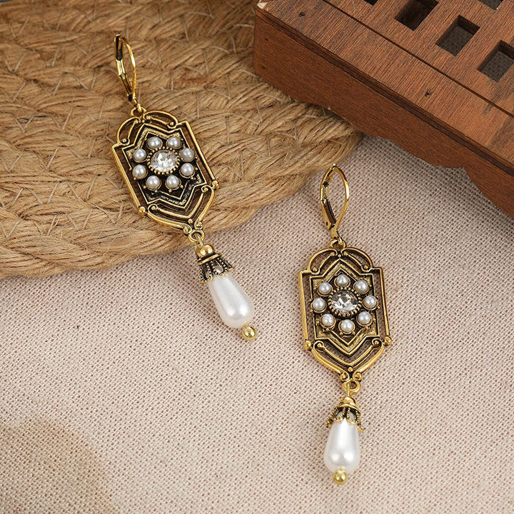 Orecchini Vintage in Perla Incastonata d'Oro
