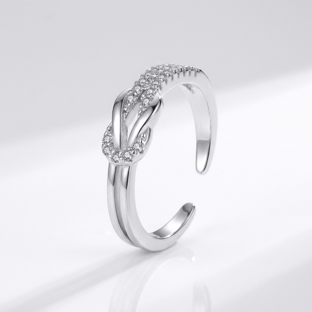 ANELLO AVVOLGENTE IN ZIRCONIA ARGENTATA - (REGOLABILE)